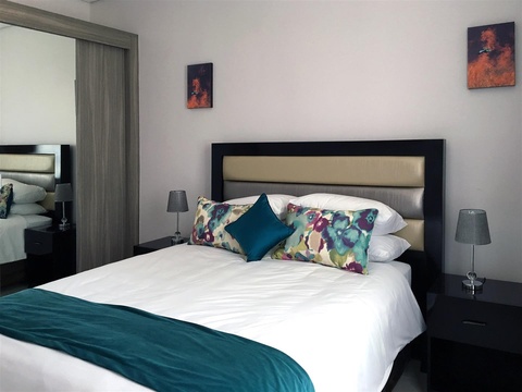 Apartments @ 125 - 2 bedroom unit; main bedroom including queen size bed